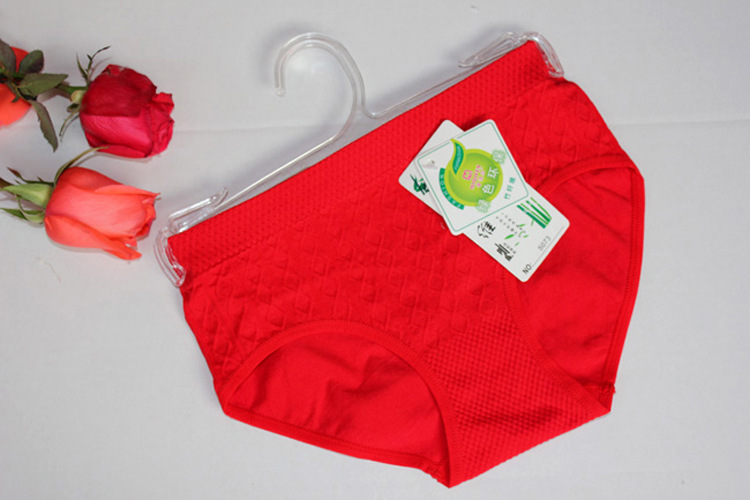 女士内裤 热销竹纤维塑身中腰美体无缝纯色三角裤 厂家现货直销