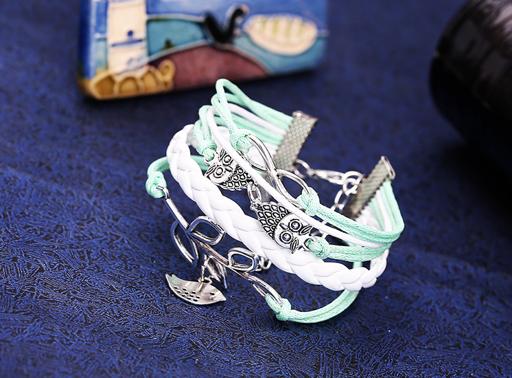 Wholesale spot fashion ancient silver owl bright leather rope bracelet