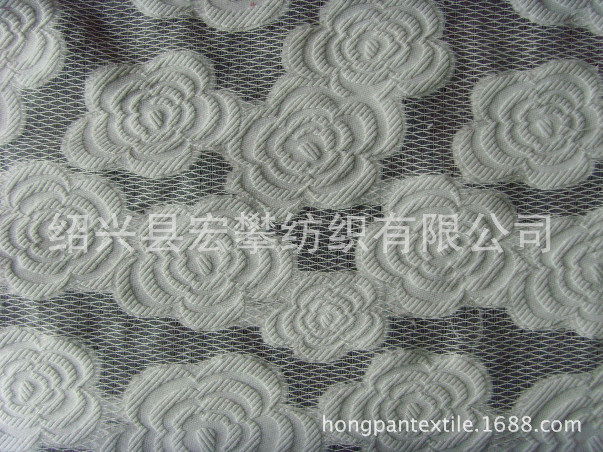 锦棉提花剪花面料牡丹花