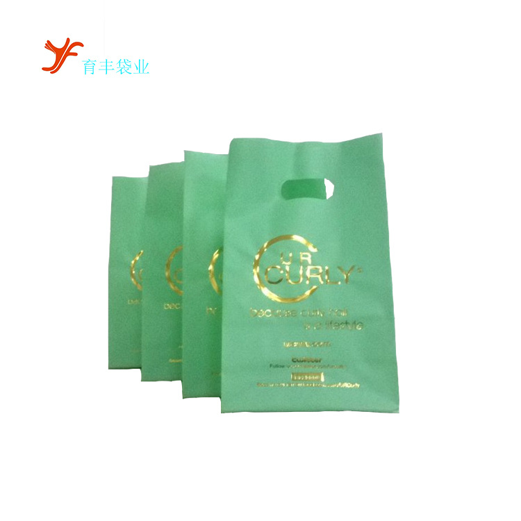 广州工厂做新款加厚胶袋 打孔手提塑料袋 表面凸字体烫金广告包袋