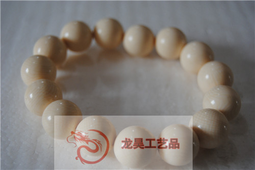 龙昊工艺品专业生产仿象牙材料 仿象牙饰品与佛牌手链手镯手串|ru