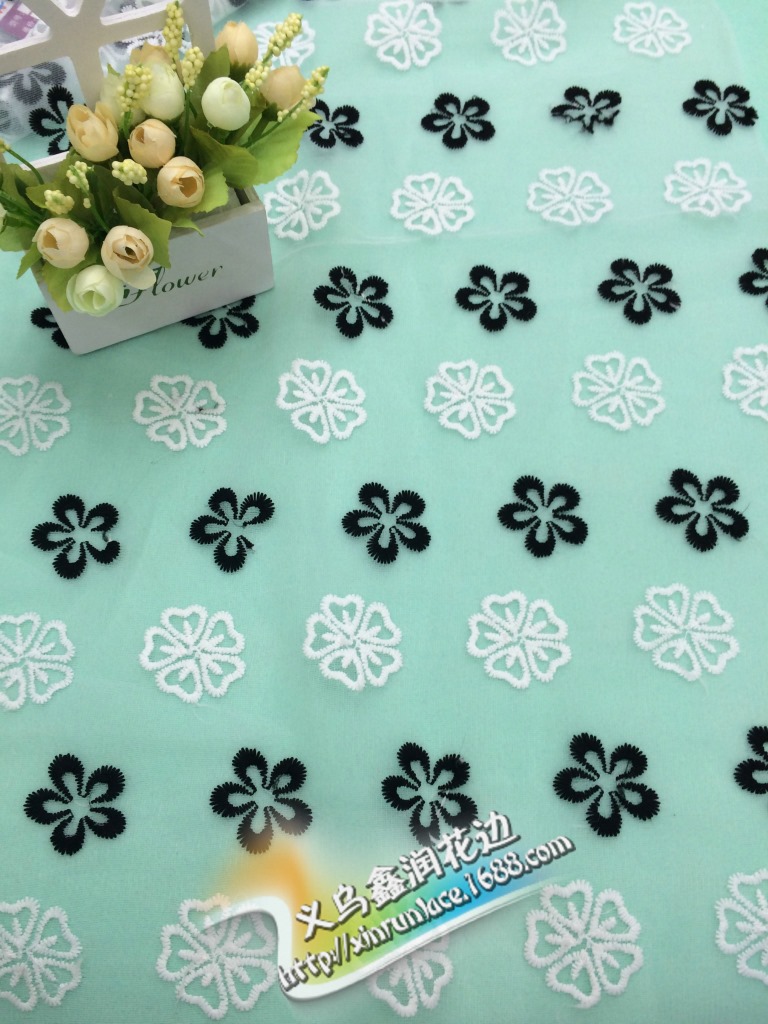 牛奶丝定型网布黑白雪花花型连衣裙花边厂家直销现货供应
