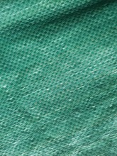 厂家供应加厚覆膜隔水防尘筒料服装包装90*140快递物流打包蛇皮袋