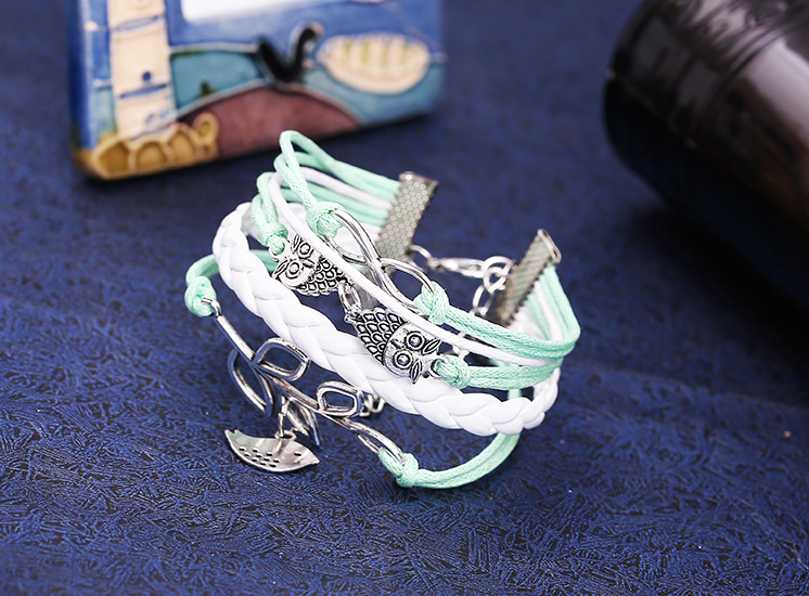 Wholesale spot fashion ancient silver owl bright leather rope bracelet