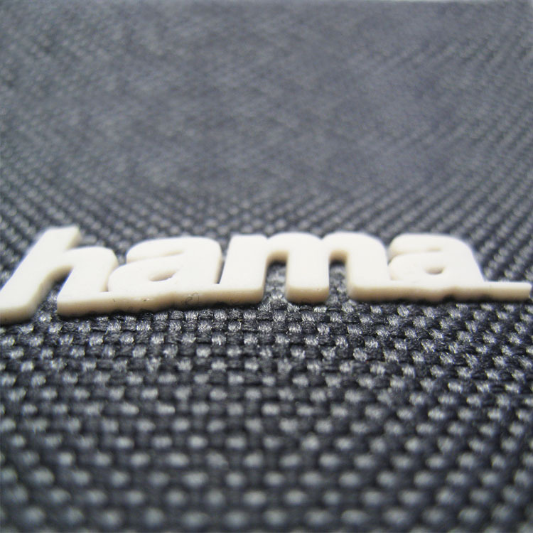 HAMA品牌相机袋LOGO商标高周波加工  注胶电压加工 硬胶注塑商标|ms