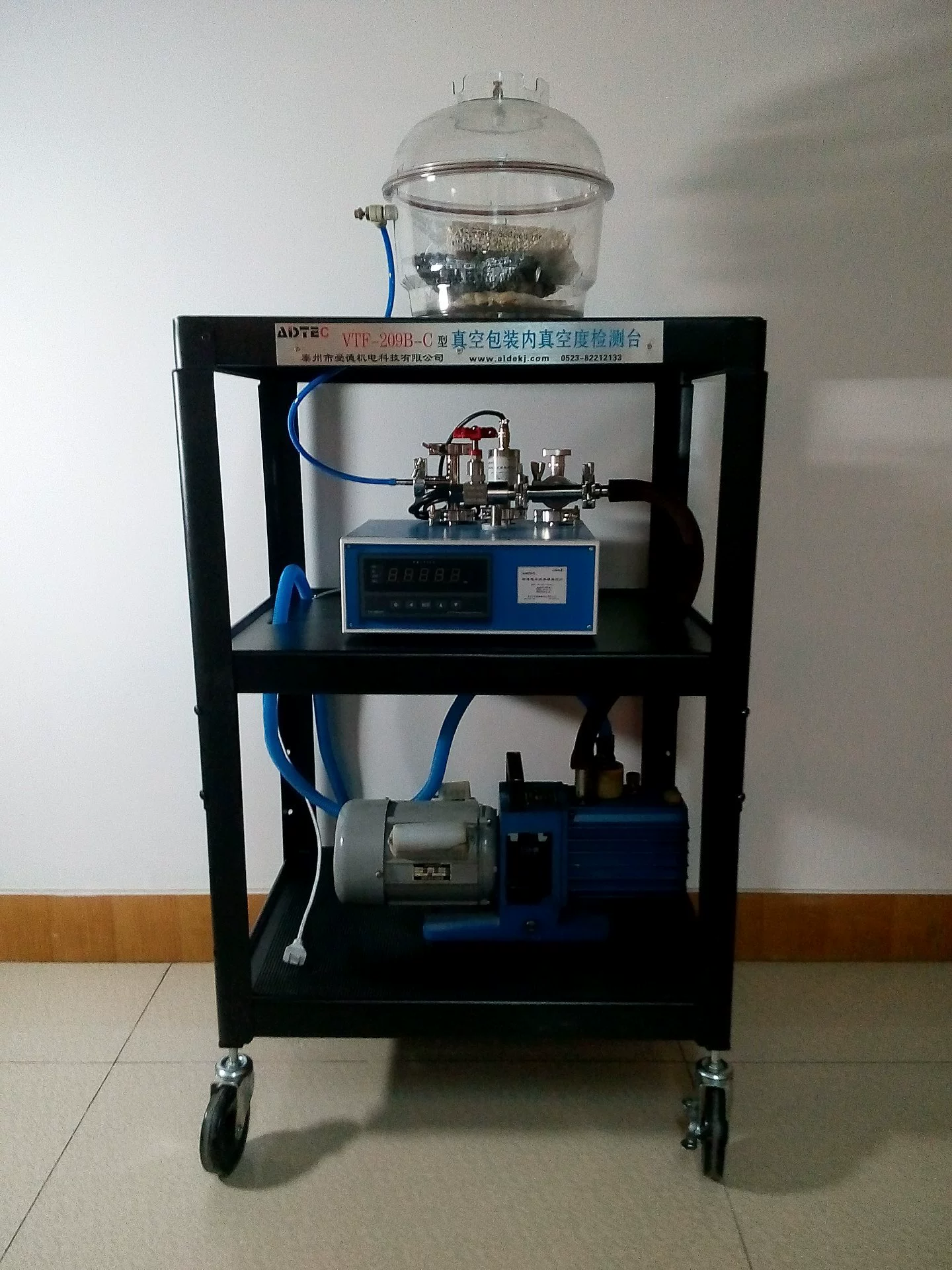 Детектор внутреннего вакуумного упаковки пищевых продуктов. Устройство обнаружения вакуумной упаковки типа Edgxinyi VTF-209.