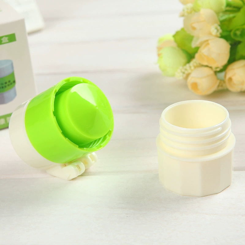 Four‑function pillbox — tablet cutter, grinder and storage, 6.3×3.7 cm, white+green or white+blue