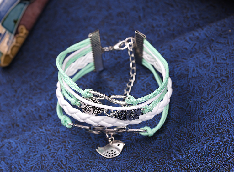 Wholesale spot fashion ancient silver owl bright leather rope bracelet