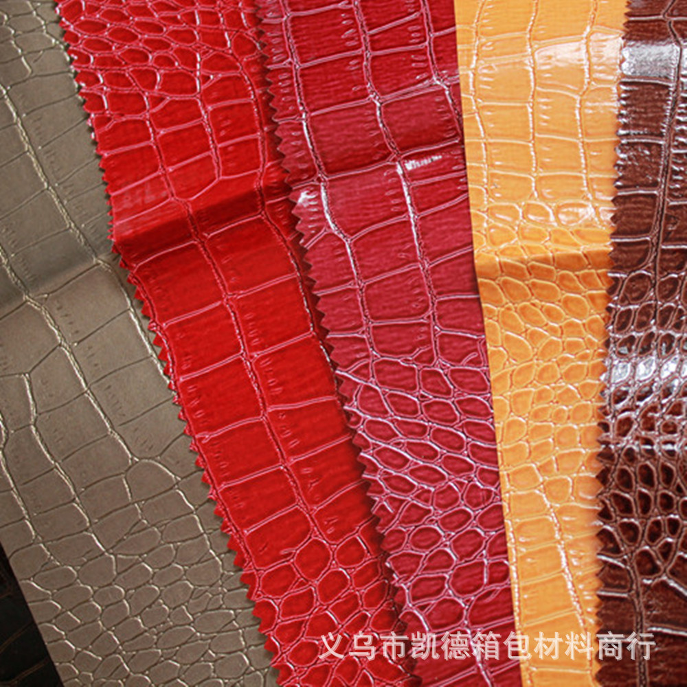 义乌厂家直销新款PVC高光鳄鱼纹人造革 包装箱包硬包装饰皮料