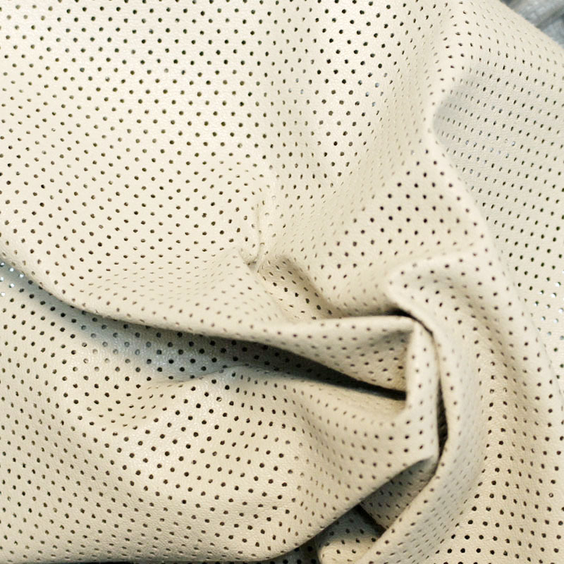 [厂家订做]打孔皮膜面料 经麂皮转移涂层压孔布料