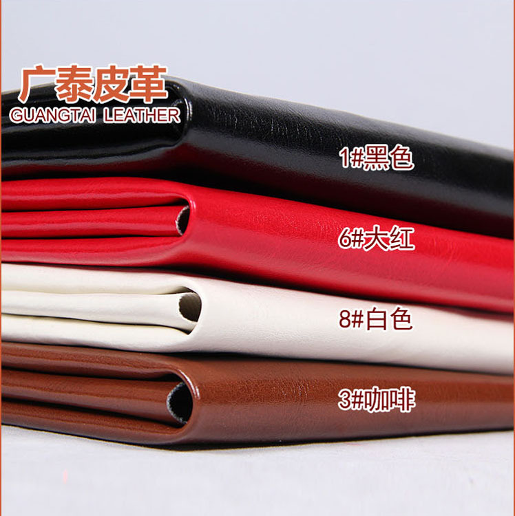 广泰皮革 PU64纹 新款上市  双色套色革  皮带箱包料 男士风范料