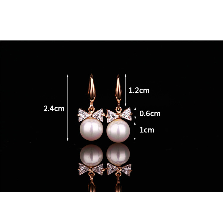 Fashion Ear Jewelry Flash Diamond Bow Earrings Large Pearl Zircon Earrings Women's Earrings display picture 1