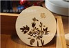 Meilan bamboo chrysanthemum wooden cushion table Creative coin wooden insulation pad hollow thermal insulation pad tea coaster