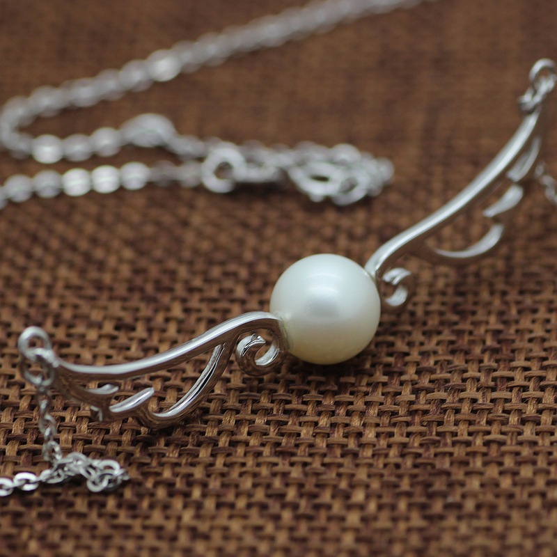 Collier Ailes et Perle Posé