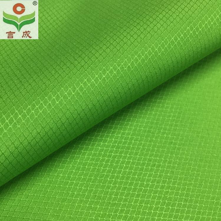 菱形格复合布校服面料 米通格/格中点春亚纺复合针织布学生校服布