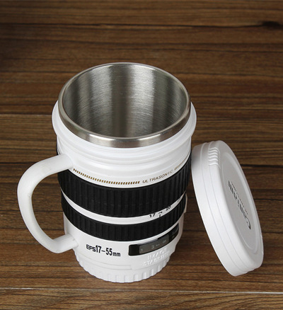 white camera lens mug with han