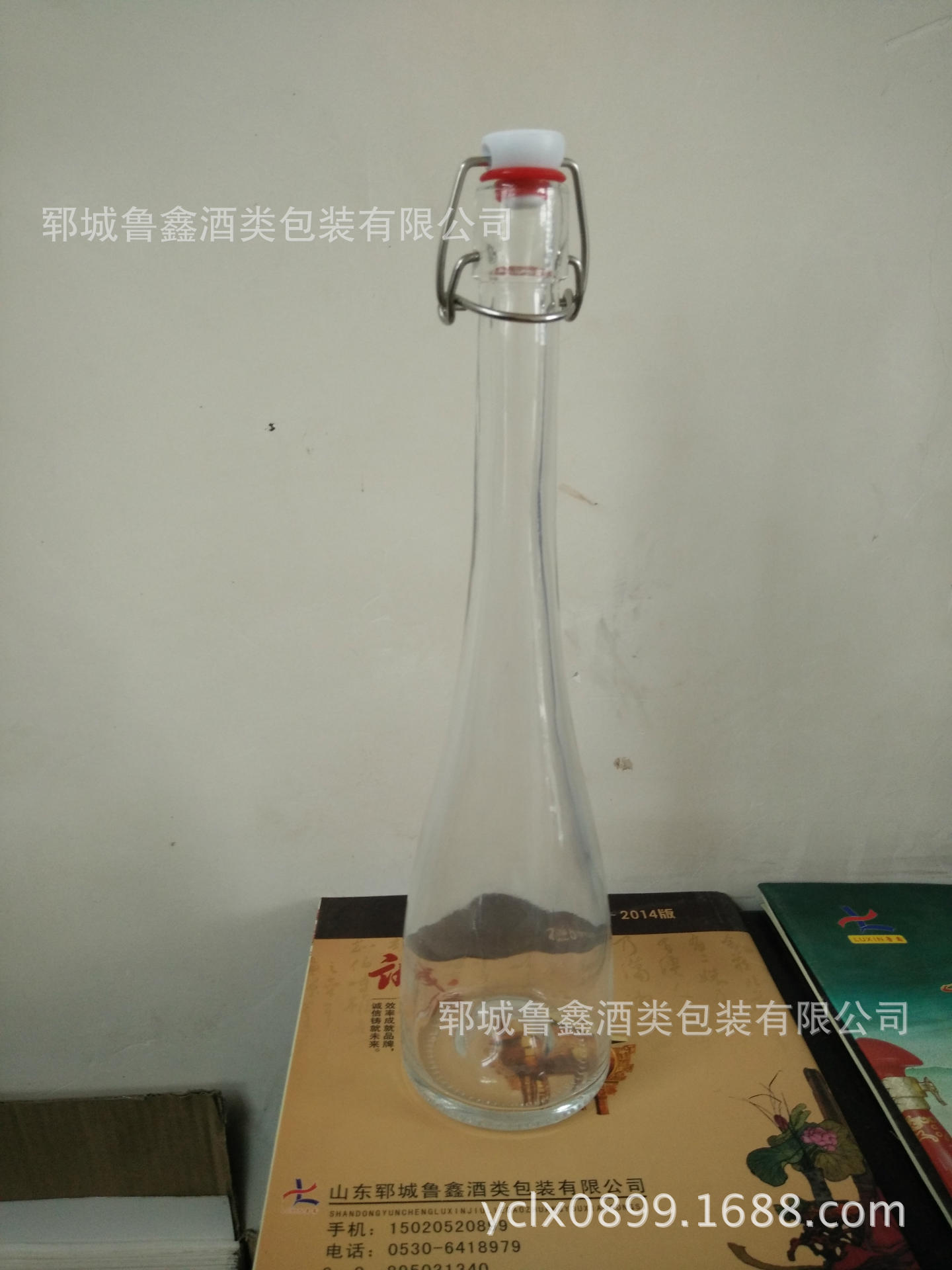 山东郓城厂家供货450ML晶白料玻璃瓶弹簧盖酒瓶