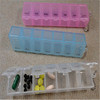 A single row of 7 -grid pills hanging a long strip suspension pill, a portable small pill box plastic storage box