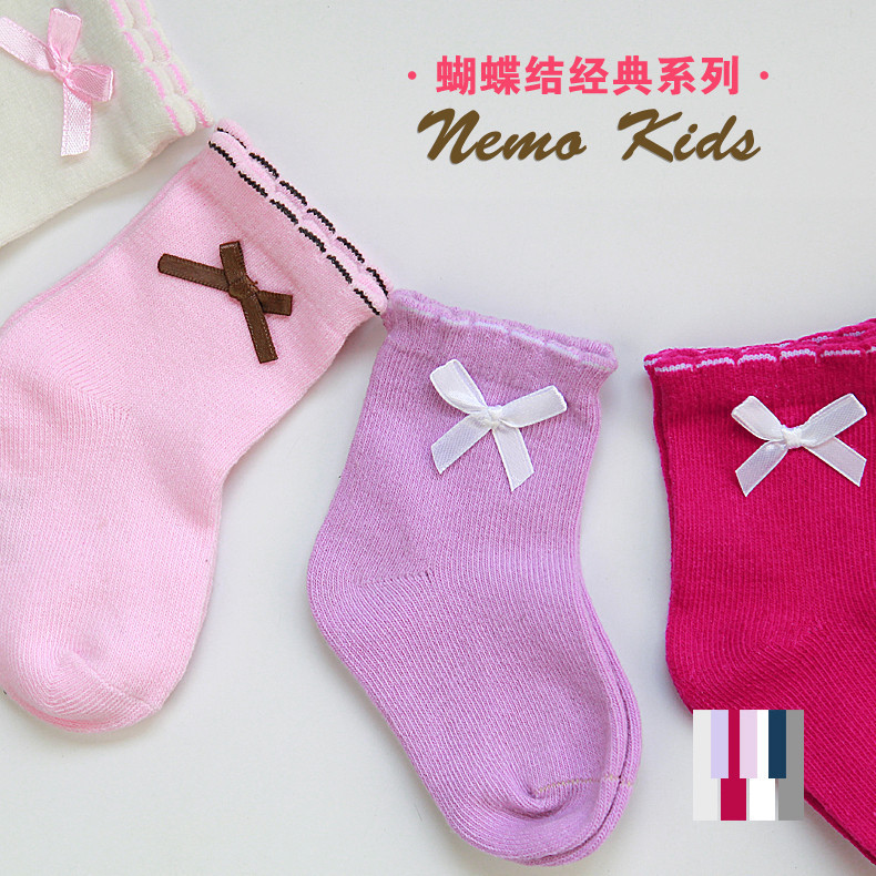 Calcetines para niños algodón peinado cabeza de costura sin hueso calcetines de bebé exquisito arco color sólido niña bebé holgado