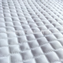 厂家定制 现货桃皮绒菱形绗绣 服装裥棉绗缝面料电脑绣花车缝加工