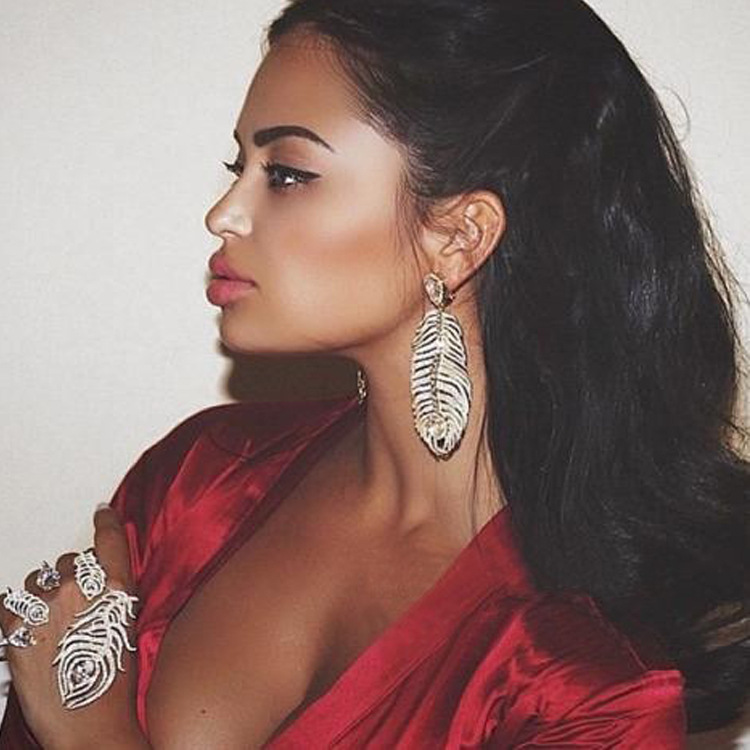 Long fashionable earrings, city style