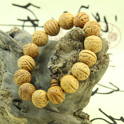 批发高仿尼泊尔凤眼菩提佛珠手串 精磨蟠桃核手链|ru