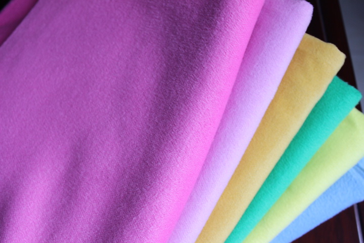 厂家直销全涤/TR拉毛布，克重540-580g/m，灌蒸双面绒