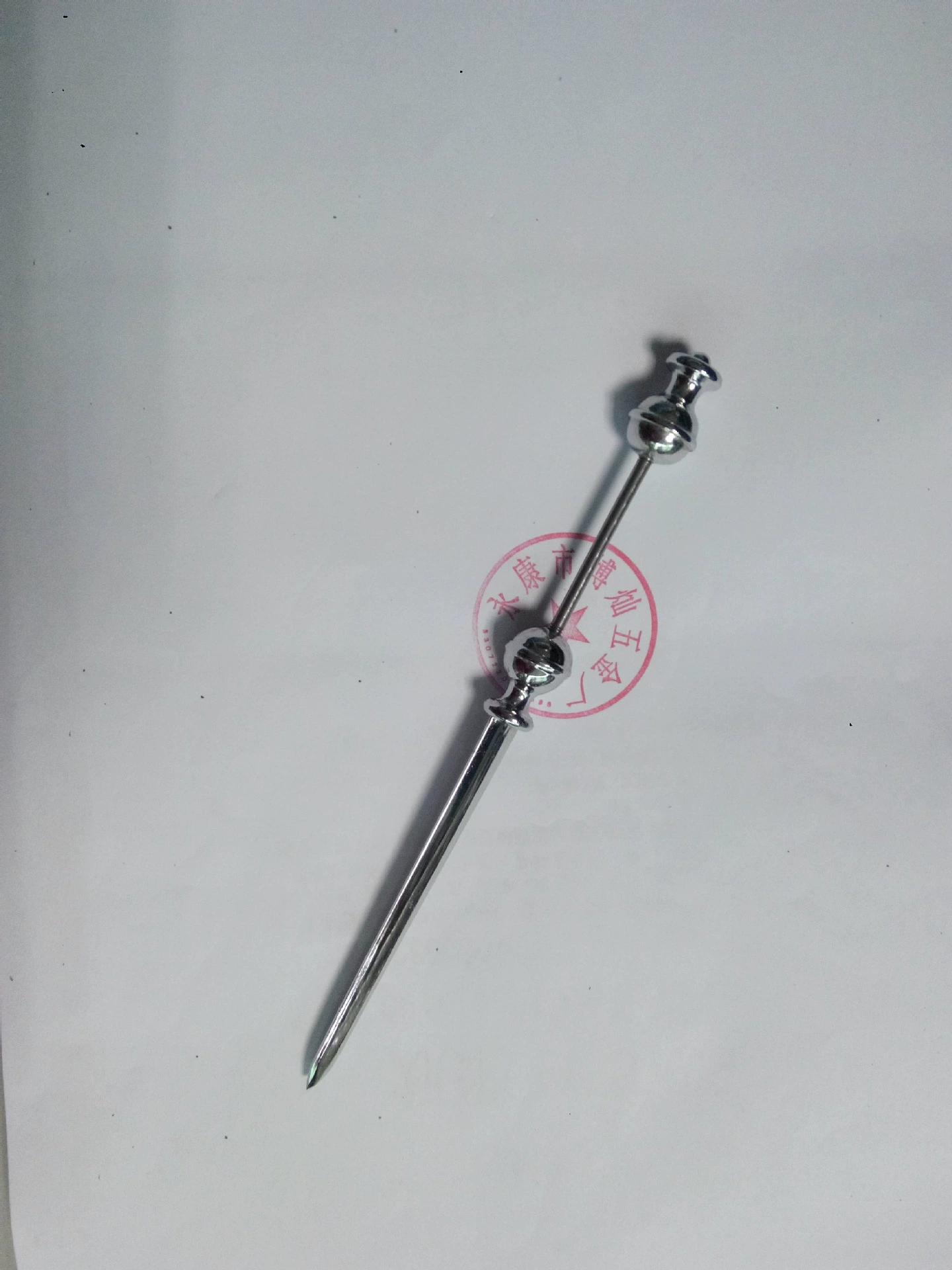 Metal opening a knife with beads