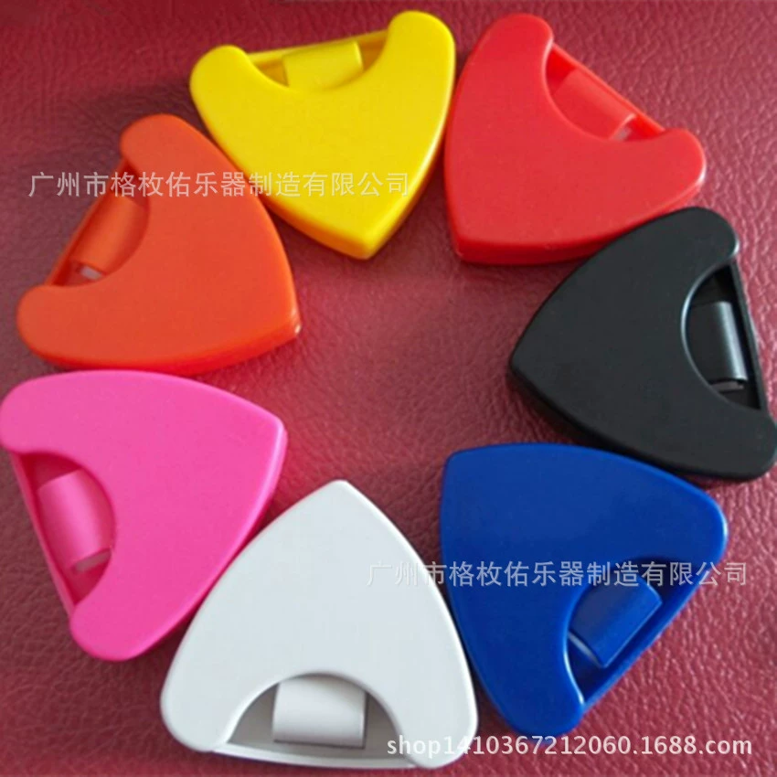 Large triangular pick clip, reinforced plastic, holds ordinary picks up to ~5 mm, high capacity