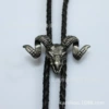 Ancient tin beef skull skeleton Bolo Tie