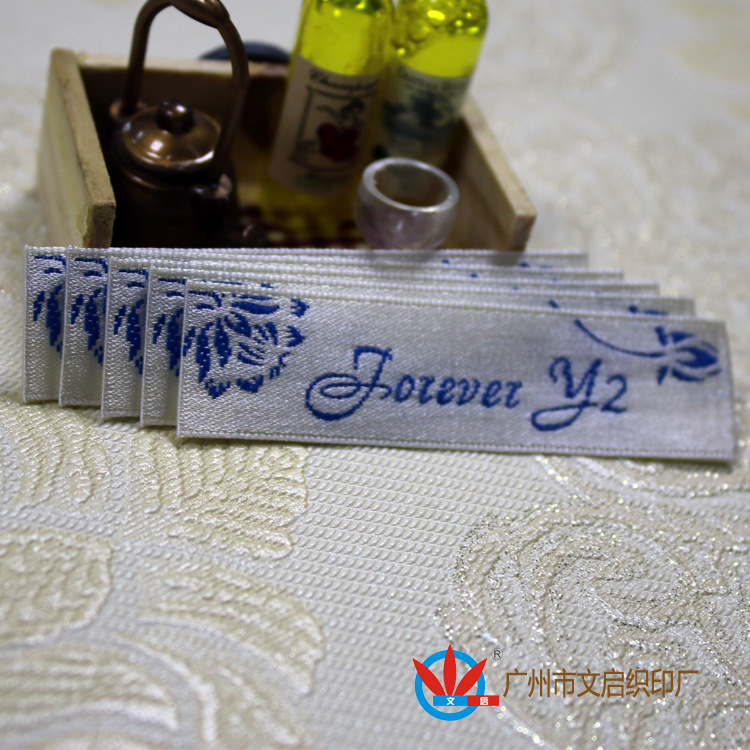 供应优惠实惠布标 双锦布标 木梭机织唛 缎面织标生产