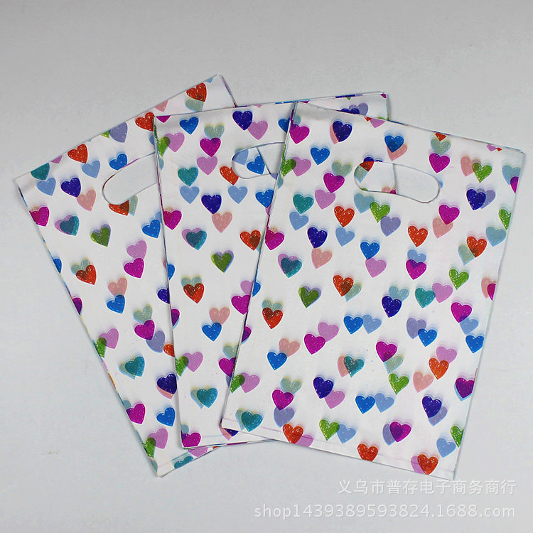 Corazón de melocotón tamaño grande y mediano tamaño pequeño bolsa de regalo bolsa de embalaje ropa bolsa de ropa bolso de plástico al por mayor un paquete de 100