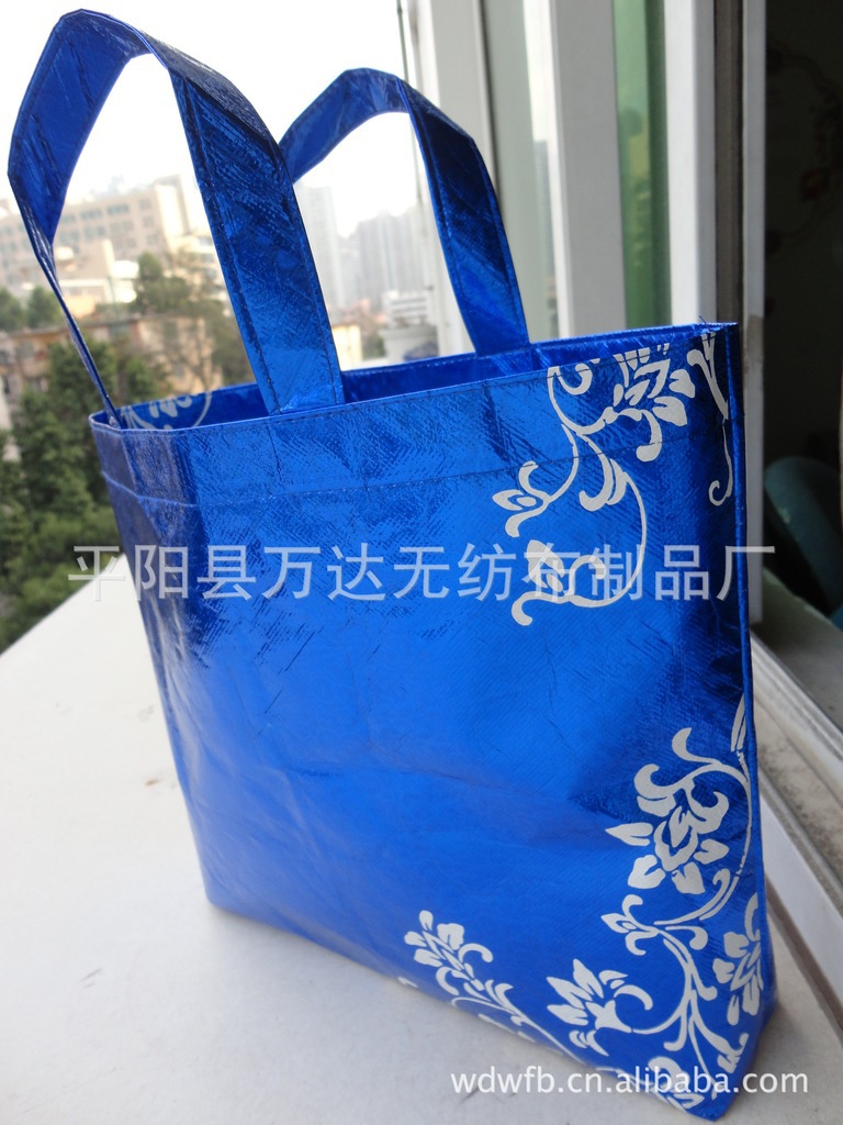 批发车缝无纺布腹膜袋 广告购物袋 四方机压热合挖角袋手提袋