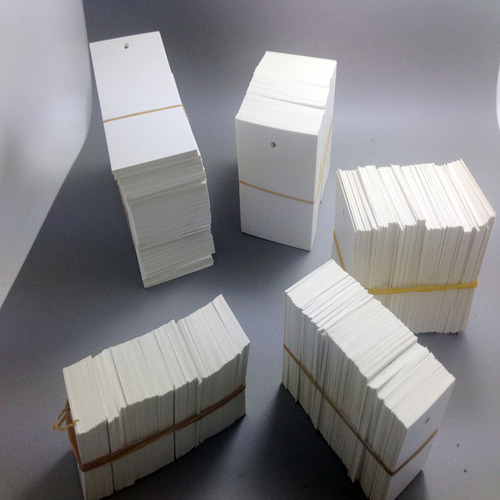 Blank clothing tag, right-angle punch, white cardboard, price tag