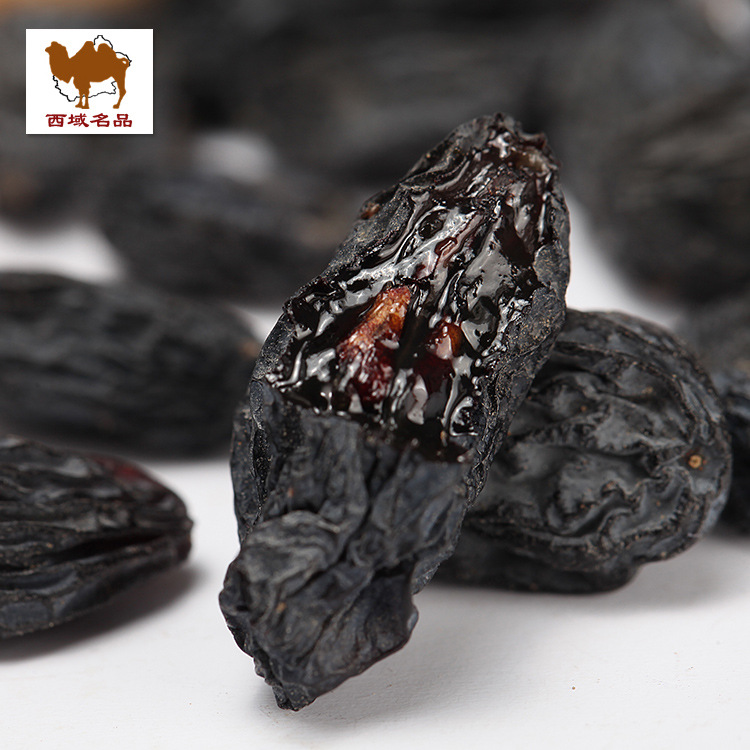 單峰駝新疆黑加侖葡萄幹20年新貨無核黑提子幹産地散裝批發包郵