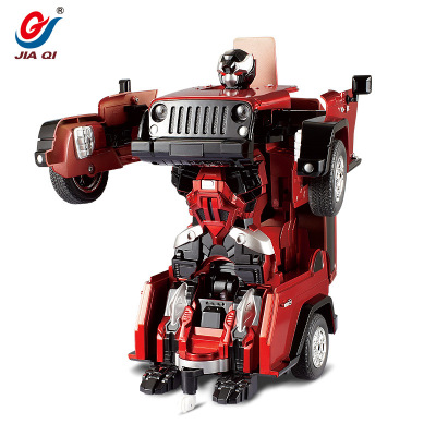 Jiaqi TT665 off-road warlord Jeep điều khiển từ xa xe một cú nhấp chuột biến dạng robot âm thanh và ánh sáng trẻ em của đồ chơi điện