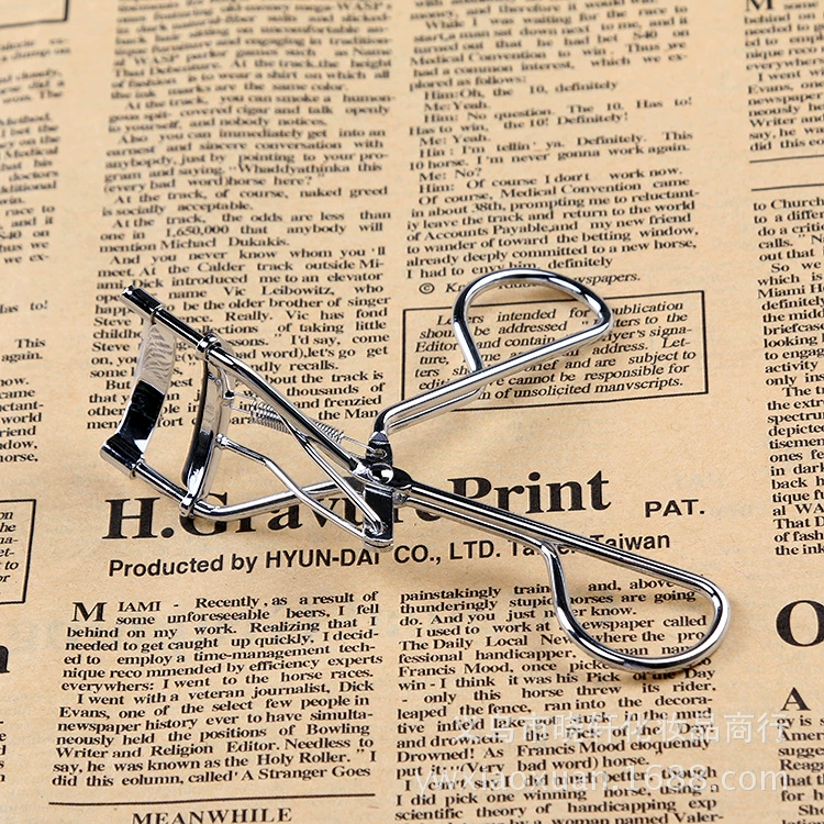 Curling cosmetic eyelash curler for eyelashes