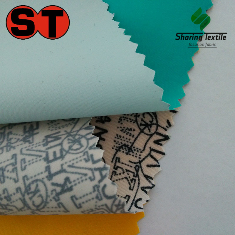 PVC涤塔夫服装面料/涤塔夫PVC雨衣面料/PVC涤塔夫雨衣面料