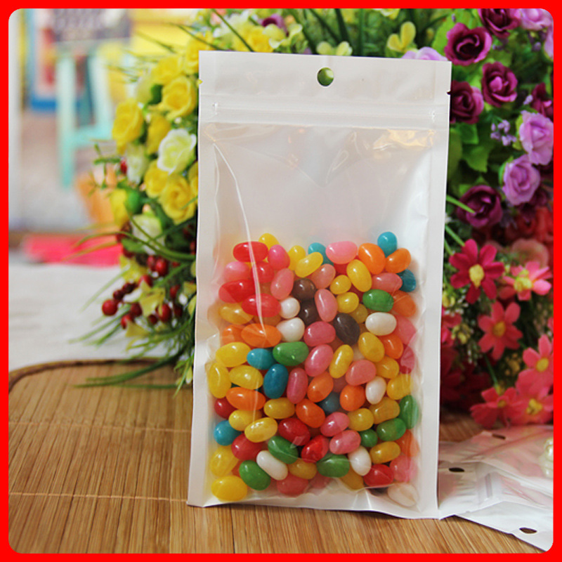 工厂直销10*18cm有挂孔白色珠光膜阴阳拉骨袋手机包装袋优质做工