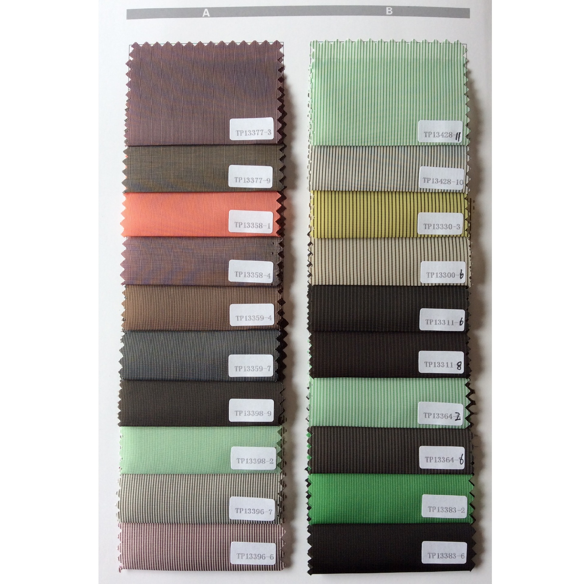 阳离子条子里料批发全涤时尚条子里布可定 制几何提花色织条子里