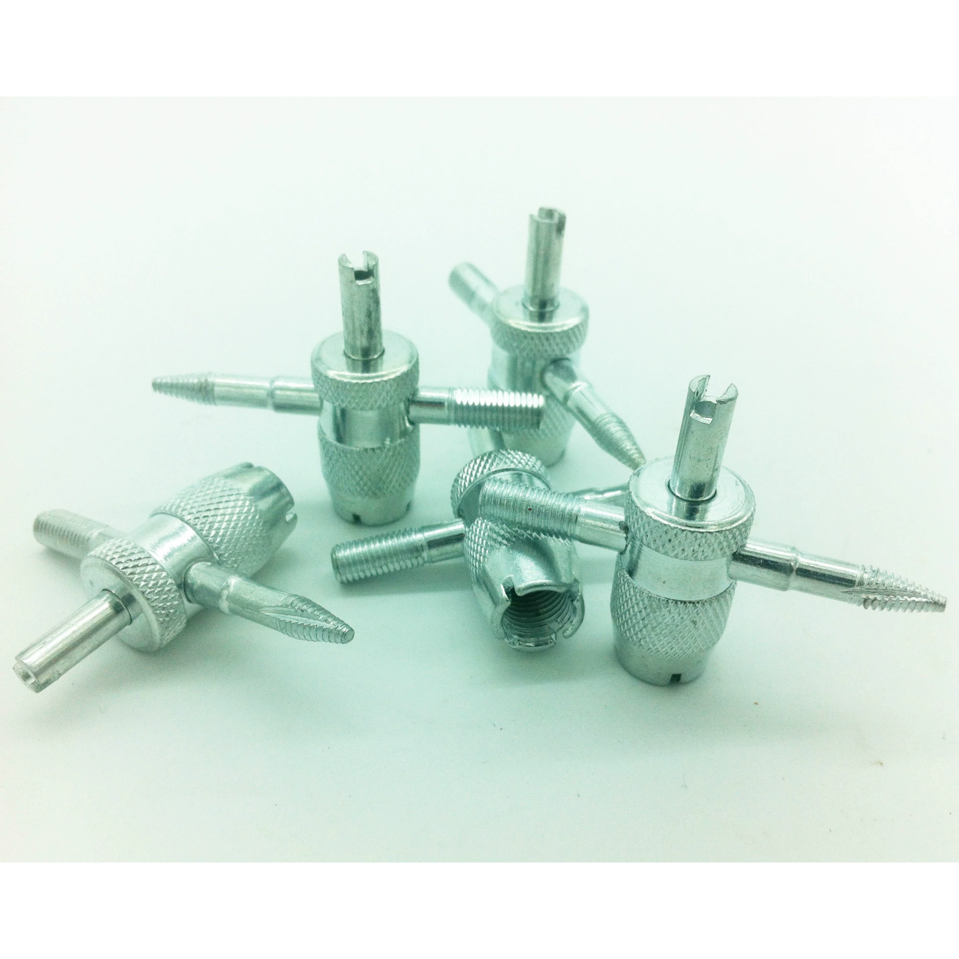 Завод прямой инструмент четыре-в-одном инструмент для ремонта клапана шины, отвертка сердечника клапана