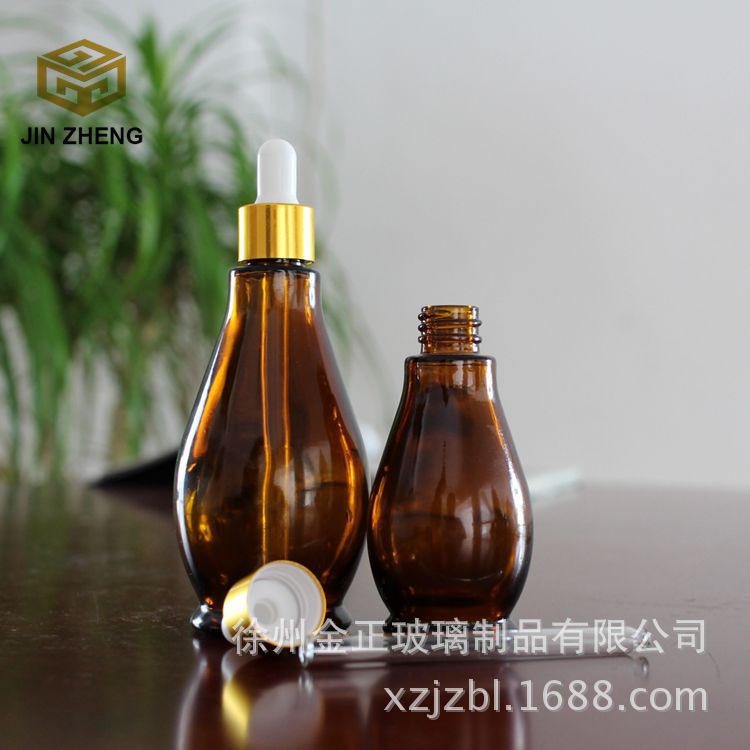 厂家供应 配套电化铝盖精油玻璃瓶100毫升茶色玻璃瓶