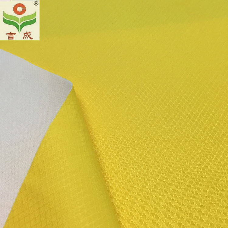 言成纺织供应 春亚纺 菱形格 全工艺 环保胶水复合校服面料