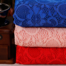 厂家太阳花蕾丝复合服装面料 春秋针织弹力多色涤棉蕾丝网布