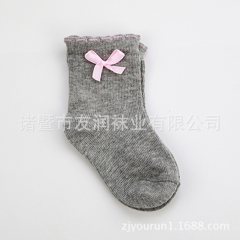 Calcetines para niños algodón peinado cabeza de costura sin hueso calcetines de bebé exquisito arco color sólido niña bebé holgado