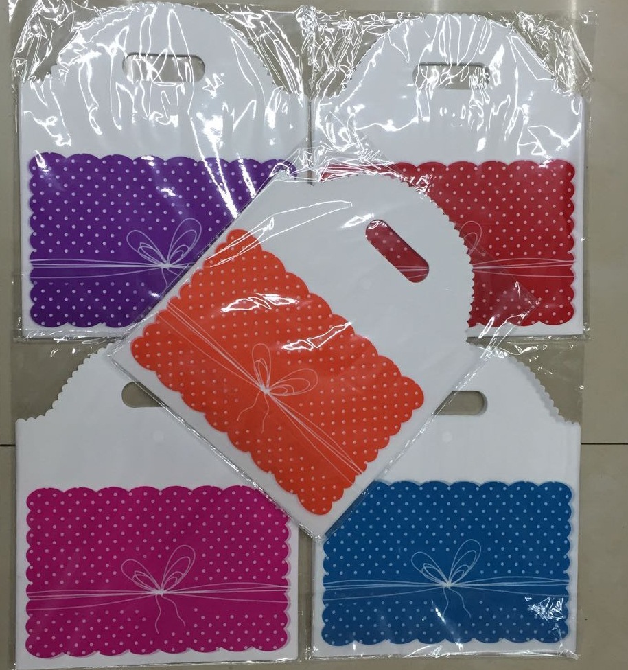 加厚 25*29品质袋弧形 内衣服装食品袋手提购物袋 挖孔礼品饰品袋