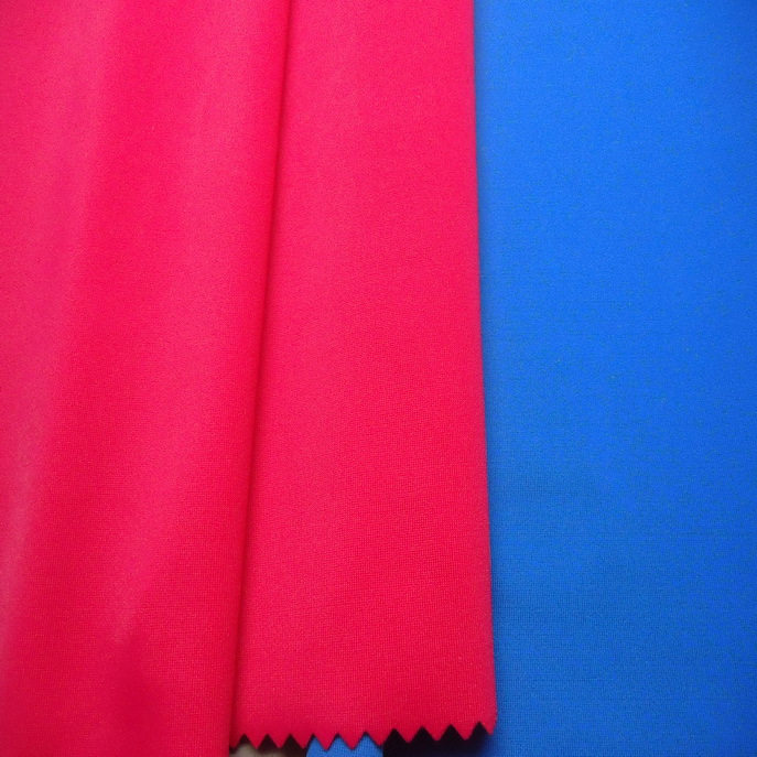 厂家直销针织经编莱卡泳装面料锦纶哑光经编内衣针织平纹布