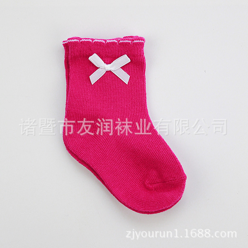 Calcetines para niños algodón peinado cabeza de costura sin hueso calcetines de bebé exquisito arco color sólido niña bebé holgado