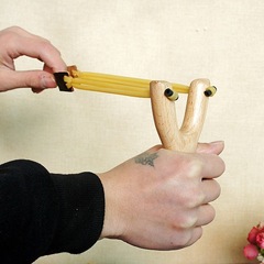 Wooden toy slingshot, red and white beech slingshot fork, best-selling product at roadside stalls and temple fairs, with skin