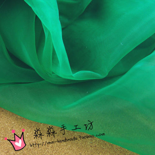 2023纺织爆款中硬加密绿色欧根纱玻璃纱 柯根纱婚纱造型面料